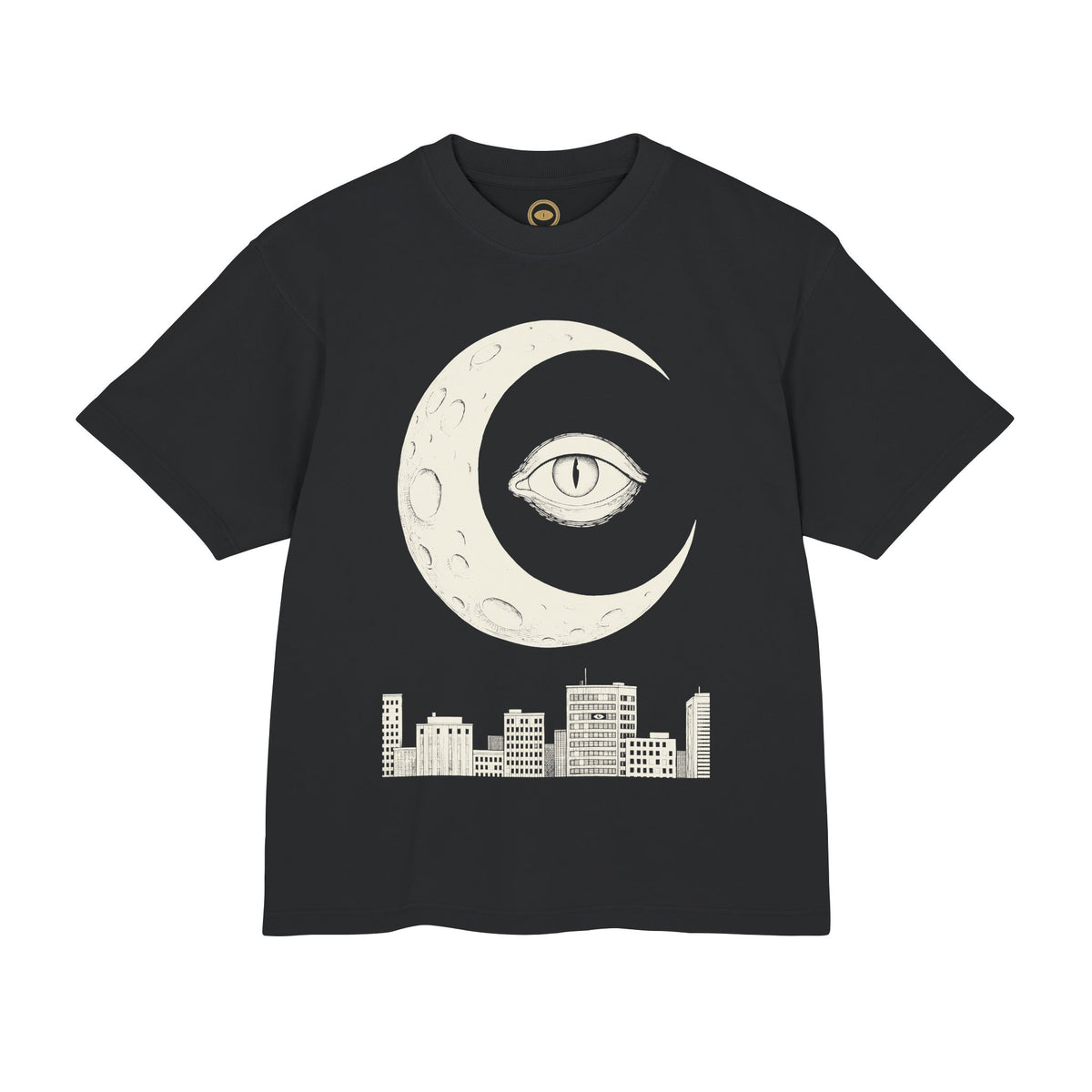 Night Shift Tee front, cream crescent moon eye over a city skyline on black