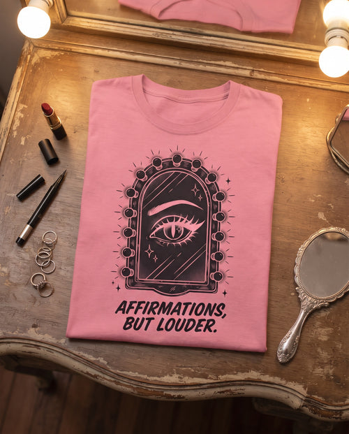But Louder Tee folded on a vintage vanity